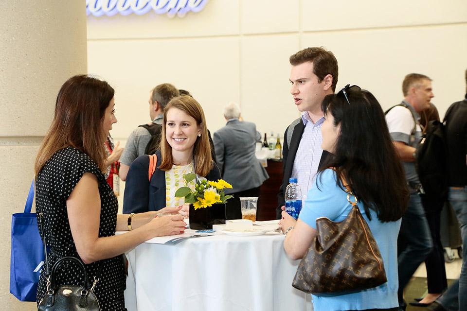 Four attendees at NPE's FLiP Reception